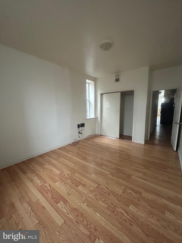 interior space with visible vents and light wood-style flooring