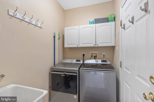 822 Rhinehart Ln, Phoenixville, PA 19460 - laundry area with cabinet space and washer and clothes dryer