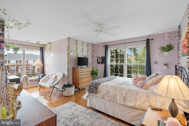 822 Rhinehart Ln, Phoenixville, PA 19460 - bedroom featuring multiple windows, wood finished floors, and a ceiling fan