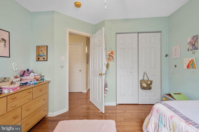 822 Rhinehart Ln, Phoenixville, PA 19460 - bedroom featuring wood finished floors, a closet, and baseboards