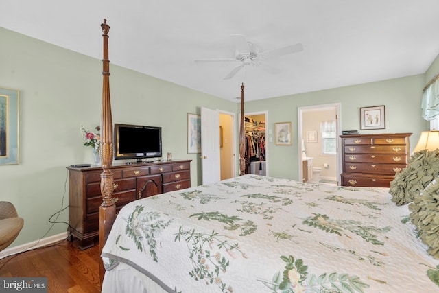 822 Rhinehart Ln, Phoenixville, PA 19460 - bedroom with wood finished floors, a walk in closet, a closet, and baseboards