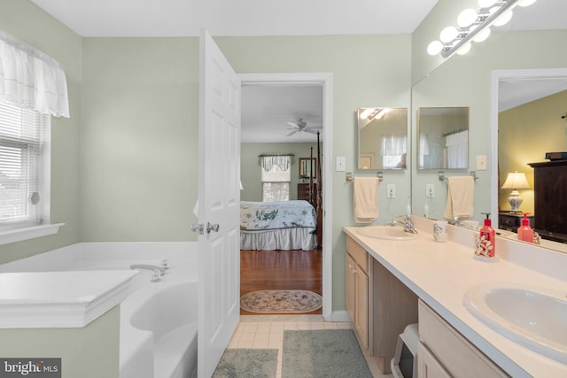 822 Rhinehart Ln, Phoenixville, PA 19460 - bathroom with ensuite bathroom, healthy amount of natural light, a ceiling fan, and a bath