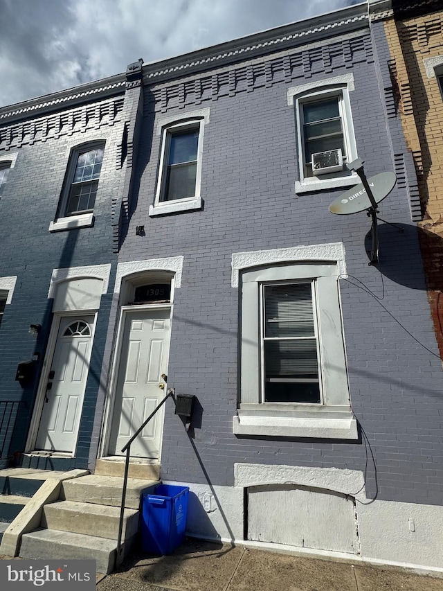1309 W Seltzer St, Philadelphia, PA 19132 - view of front facade featuring brick siding and entry steps