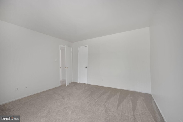 104 Monroe St Unit 201, Rockville, MD 20850 - unfurnished room featuring carpet and baseboards
