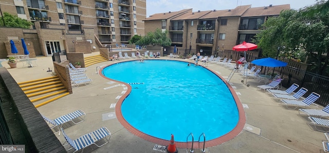 104 Monroe St Unit 201, Rockville, MD 20850 - community pool with a patio area