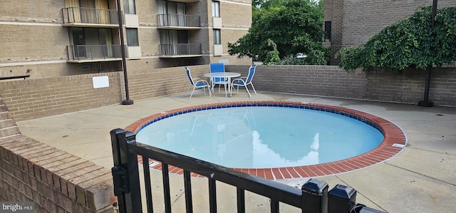 104 Monroe St Unit 201, Rockville, MD 20850 - view of pool featuring a patio area
