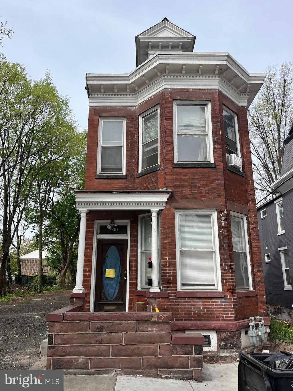 2628 N 6th St, Harrisburg, PA 17110 - italianate house featuring brick siding, cooling unit, and central air condition unit