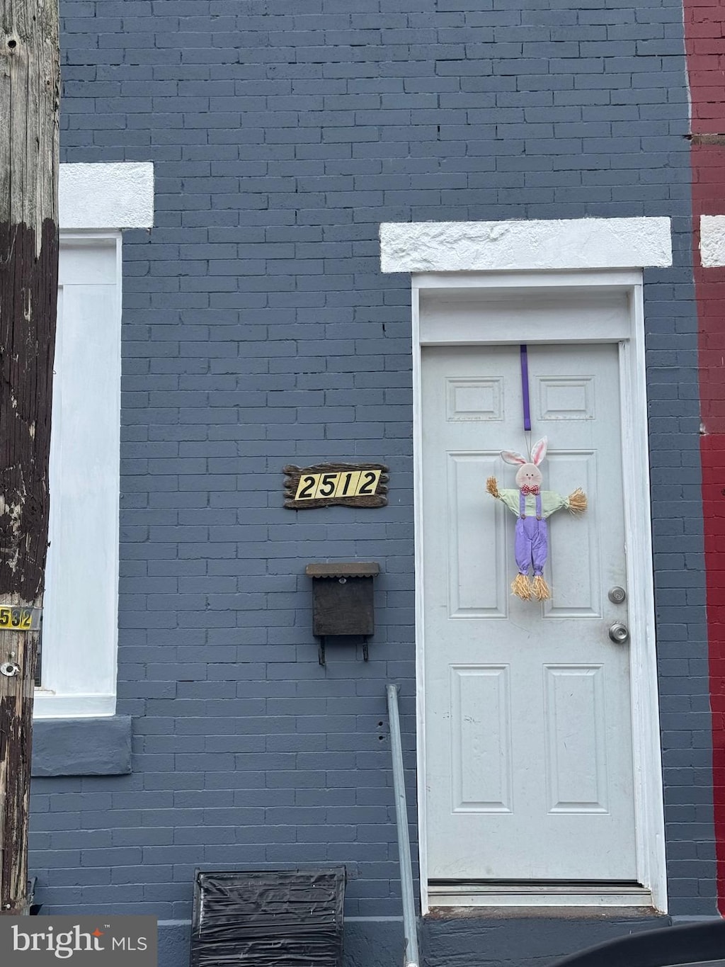 2512 W Seltzer St, Philadelphia, PA 19132 - property entrance featuring brick siding