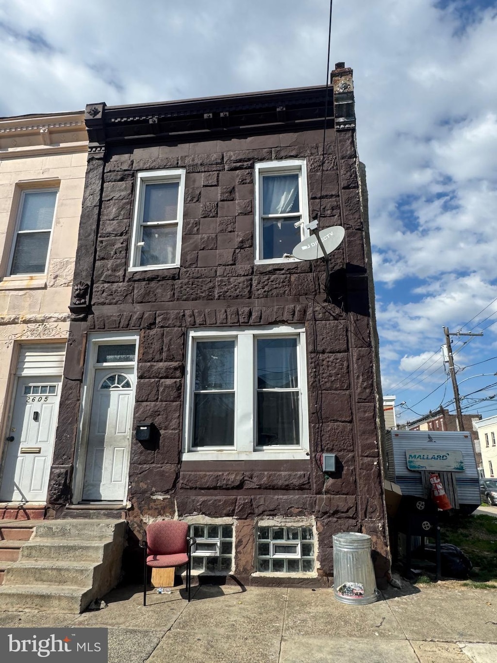 townhome / multi-family property with entry steps