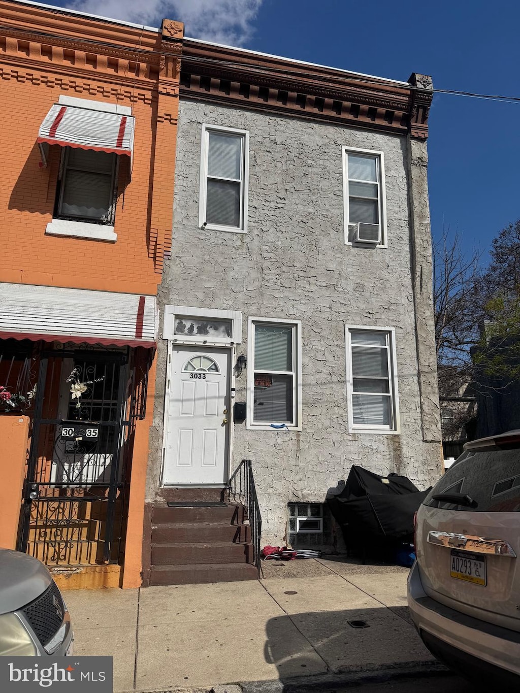 3033 N 10th St, Philadelphia, PA 19133 - view of property featuring entry steps and cooling unit