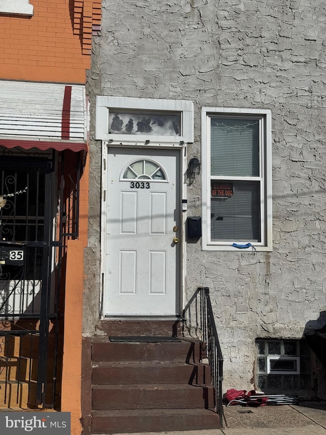 3033 N 10th St, Philadelphia, PA 19133 - property entrance featuring stone siding