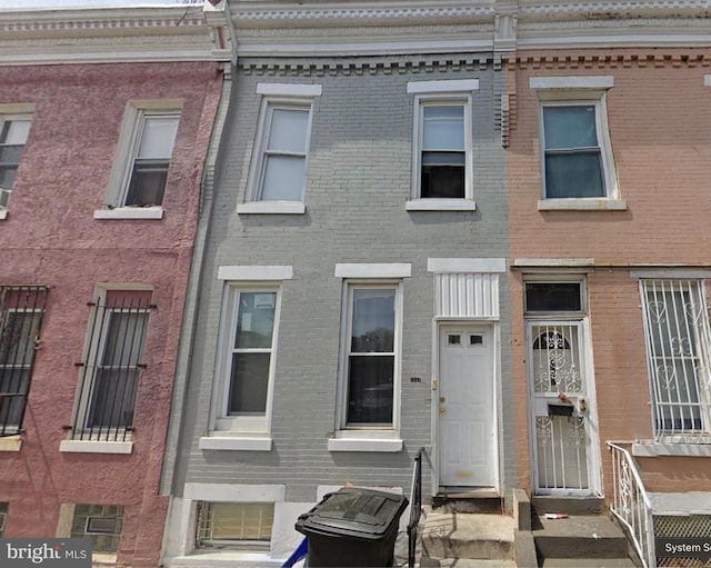 3128 N Darien St, Philadelphia, PA 19133 - townhome / multi-family property featuring brick siding