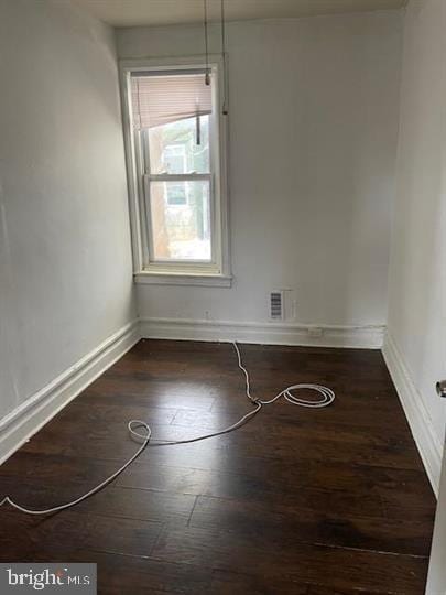 3128 N Darien St, Philadelphia, PA 19133 - unfurnished dining area with baseboards, visible vents, and hardwood / wood-style floors