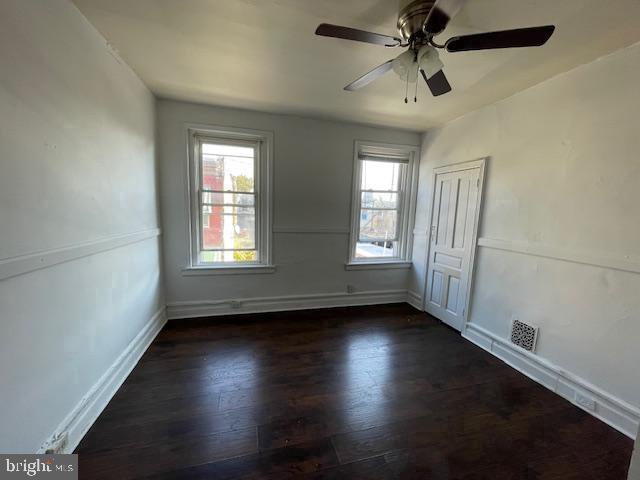 3128 N Darien St, Philadelphia, PA 19133 - unfurnished room with a ceiling fan, baseboards, visible vents, and wood finished floors