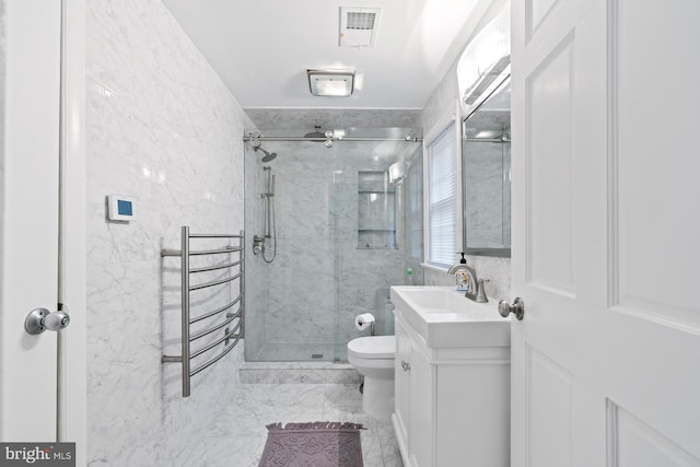 bathroom with visible vents, toilet, vanity, marble finish floor, and a stall shower