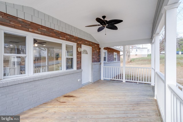 deck with a porch and ceiling fan