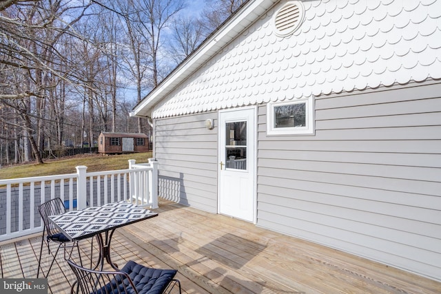 deck with an outdoor structure