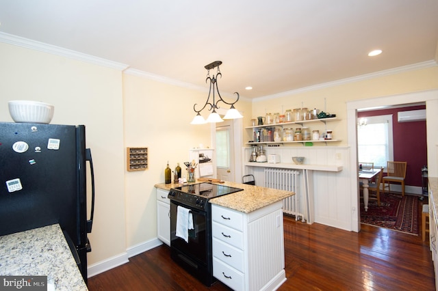 111 Somerset Ave, Cambridge, MD 21613 - kitchen featuring radiator, black appliances, a peninsula, and dark wood-type flooring