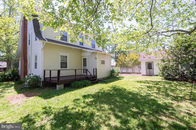111 Somerset Ave, Cambridge, MD 21613 - back of property featuring a wooden deck and a yard