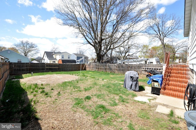 view of yard featuring a fenced backyard