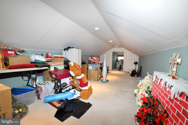 interior space with recessed lighting, carpet flooring, and vaulted ceiling