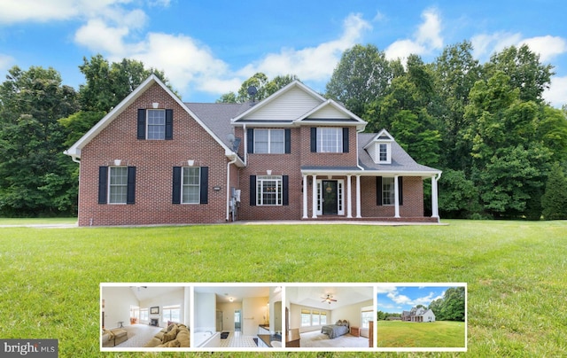 8900 Leonardo St, Pomfret, MD 20675 - view of front of home with brick siding, a front lawn, and covered porch