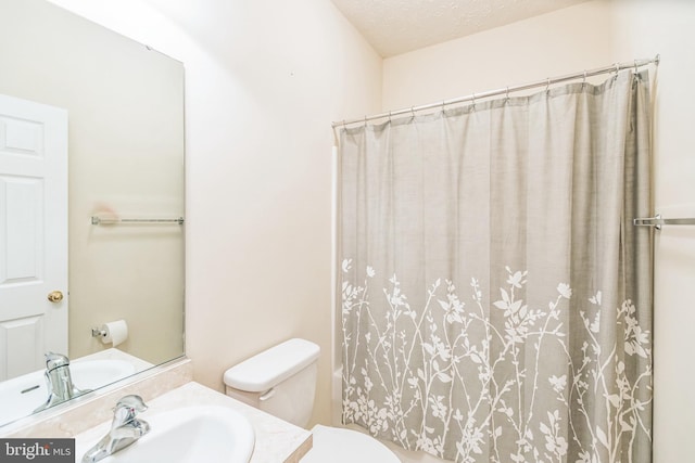 8900 Leonardo St, Pomfret, MD 20675 - bathroom featuring vanity, toilet, and curtained shower