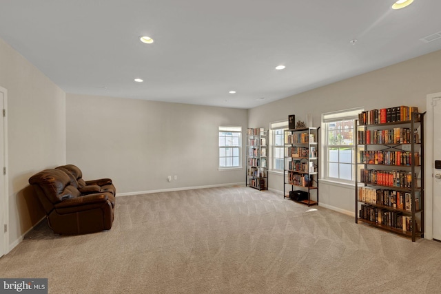 sitting room with carpet floors, baseboards, visible vents, and recessed lighting