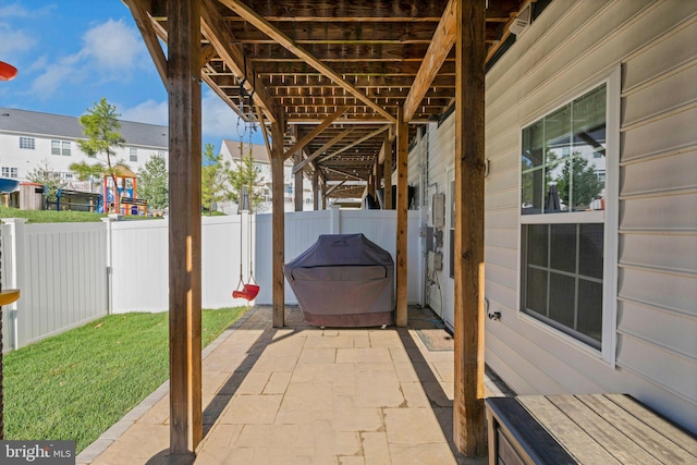 view of patio with fence