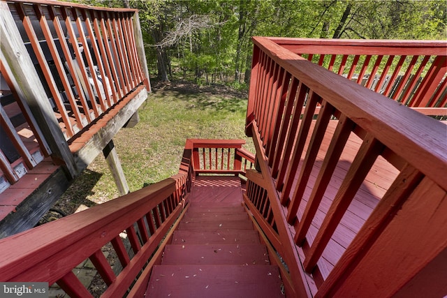 deck featuring a yard
