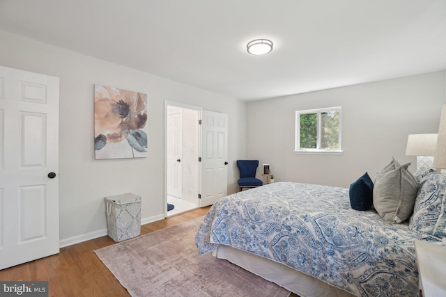 908 Queens Ter, Fort Washington, MD 20744 - bedroom featuring baseboards and wood finished floors