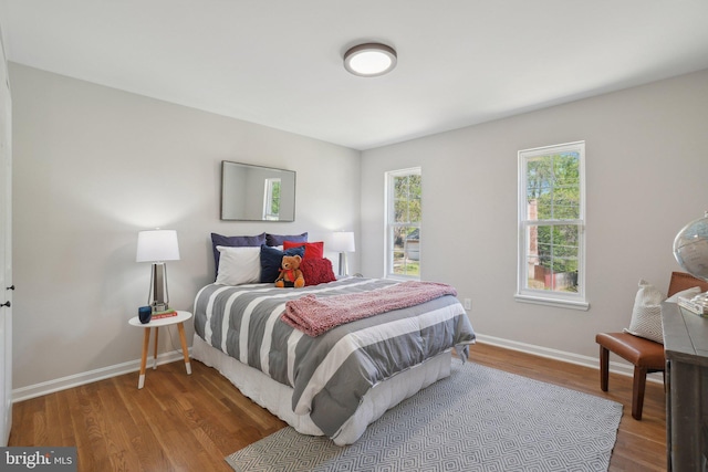 908 Queens Ter, Fort Washington, MD 20744 - bedroom featuring baseboards and wood finished floors