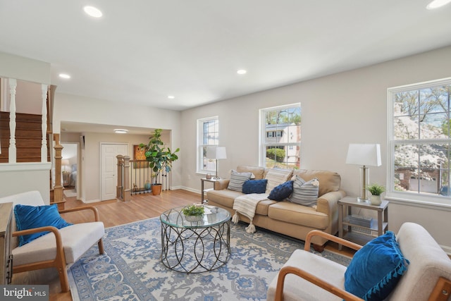 908 Queens Ter, Fort Washington, MD 20744 - living area featuring baseboards, wood finished floors, stairs, and recessed lighting