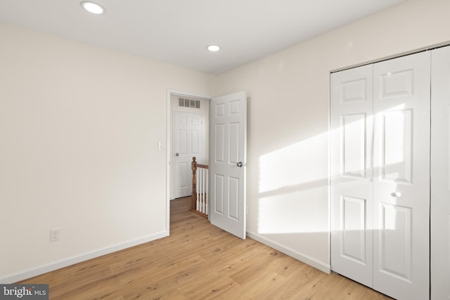 9550 Hagel Cir Unit 10/D, Lorton, VA 22079 - unfurnished bedroom featuring light wood finished floors, recessed lighting, a closet, and baseboards