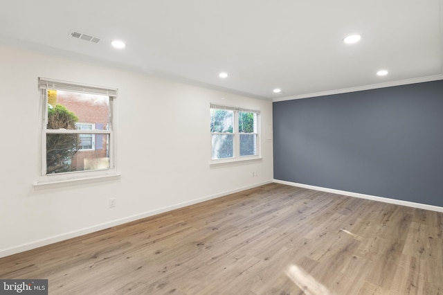 9550 Hagel Cir Unit 10/D, Lorton, VA 22079 - empty room with wood finished floors, visible vents, ornamental molding, and baseboards
