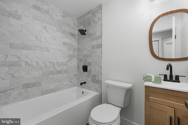full bathroom featuring toilet, vanity, and washtub / shower combination