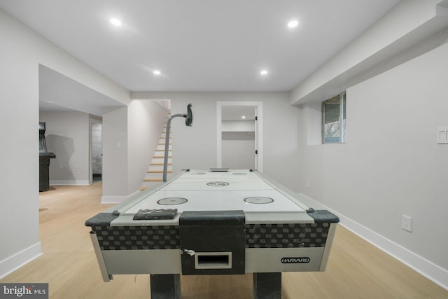 game room featuring recessed lighting, light wood-type flooring, and baseboards