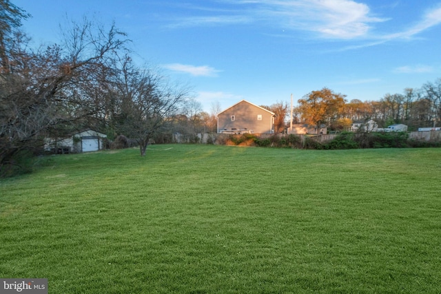 view of yard with a garage
