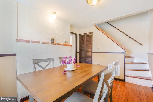 9056 Baltimore St, Savage, MD 20763 - dining space with stairway and hardwood / wood-style floors