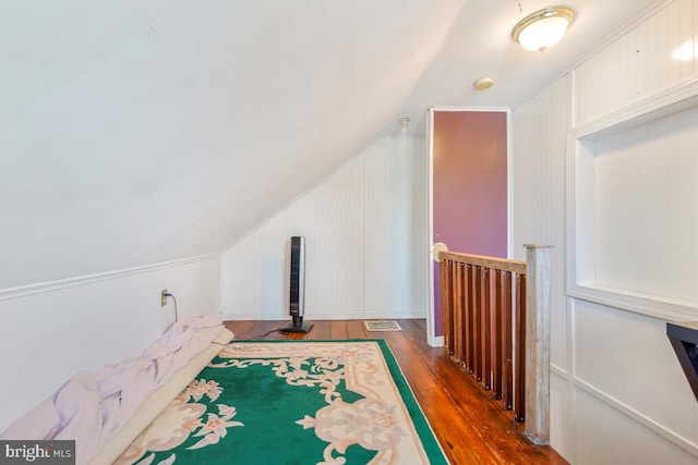 9056 Baltimore St, Savage, MD 20763 - bonus room featuring wood finished floors, visible vents, and vaulted ceiling