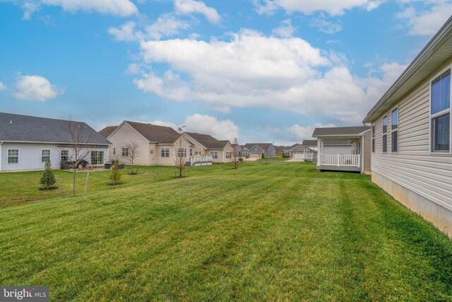 view of yard with a residential view