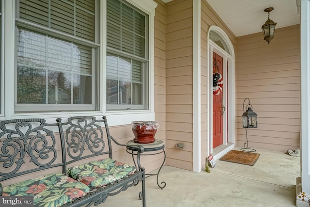 doorway to property featuring a porch
