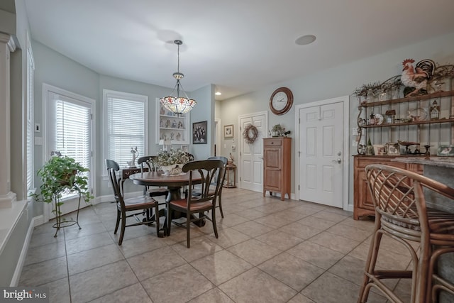 dining area with recessed lighting, baseboards, and light tile patterned floors
