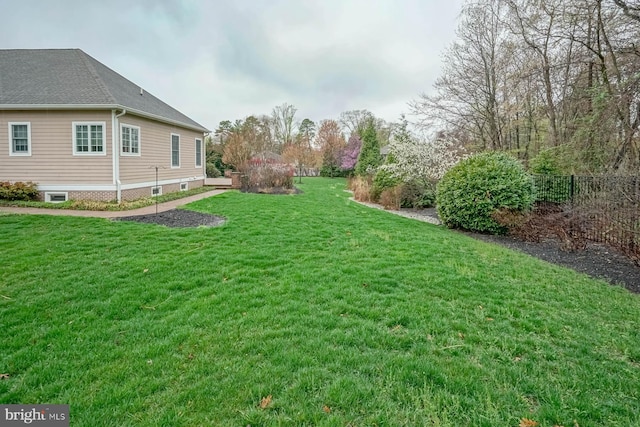 view of yard with fence