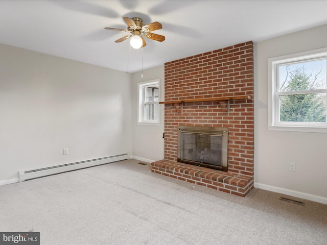 449 Fairview Cir, Woodstock, VA 22664 - unfurnished living room featuring a fireplace, plenty of natural light, carpet floors, and baseboard heating