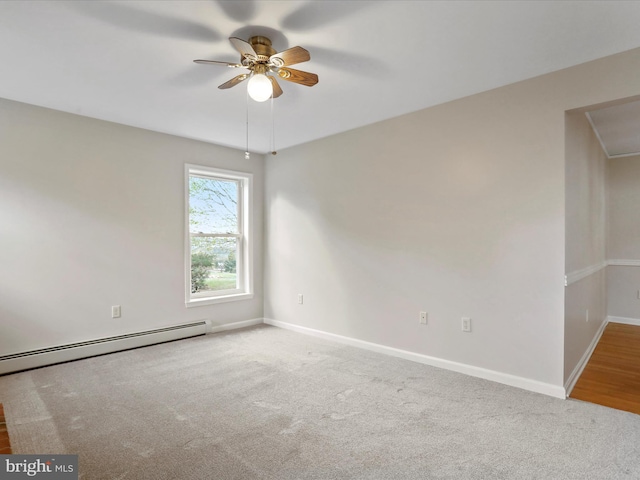 449 Fairview Cir, Woodstock, VA 22664 - carpeted empty room featuring a baseboard heating unit, baseboards, and ceiling fan