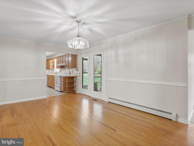 449 Fairview Cir, Woodstock, VA 22664 - unfurnished dining area with a baseboard radiator, light wood-style floors, a chandelier, and a sink