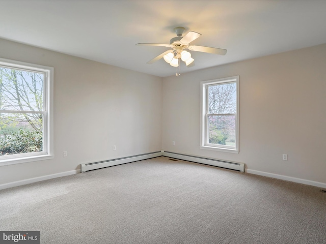 449 Fairview Cir, Woodstock, VA 22664 - carpeted empty room with baseboard heating, a wealth of natural light, a ceiling fan, and baseboards