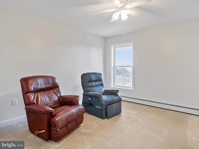 449 Fairview Cir, Woodstock, VA 22664 - living area featuring a baseboard heating unit, a ceiling fan, baseboards, and light colored carpet