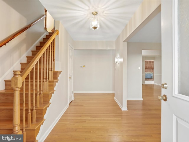 449 Fairview Cir, Woodstock, VA 22664 - foyer entrance with baseboards, wood finished floors, and stairs